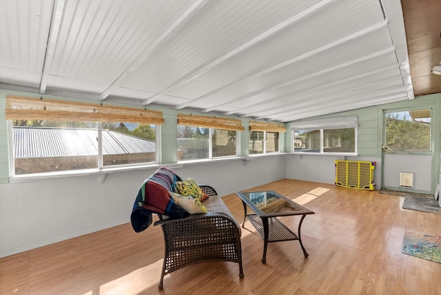 sunroom / solarium with wood finished floors