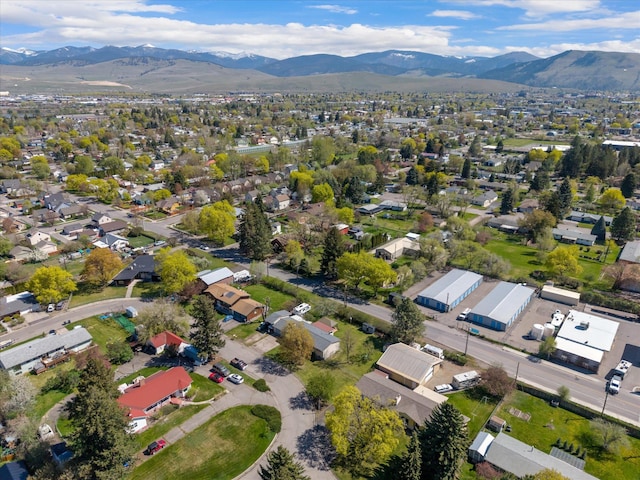 birds eye view of property featuring a mountain view and a residential view