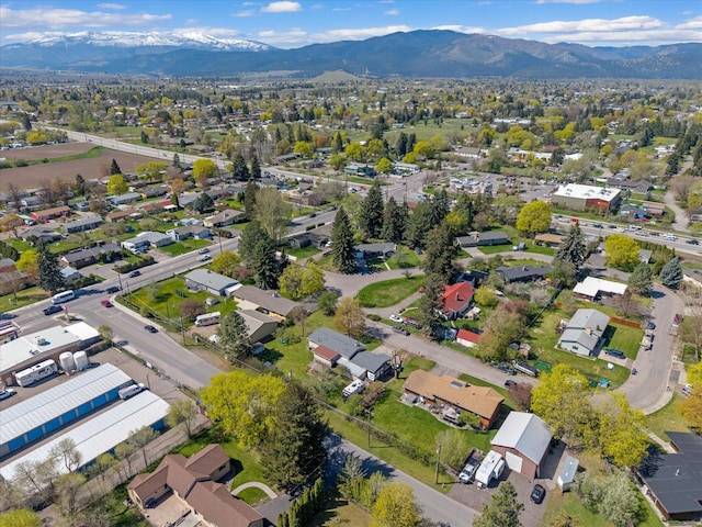 drone / aerial view featuring a residential view and a mountain view