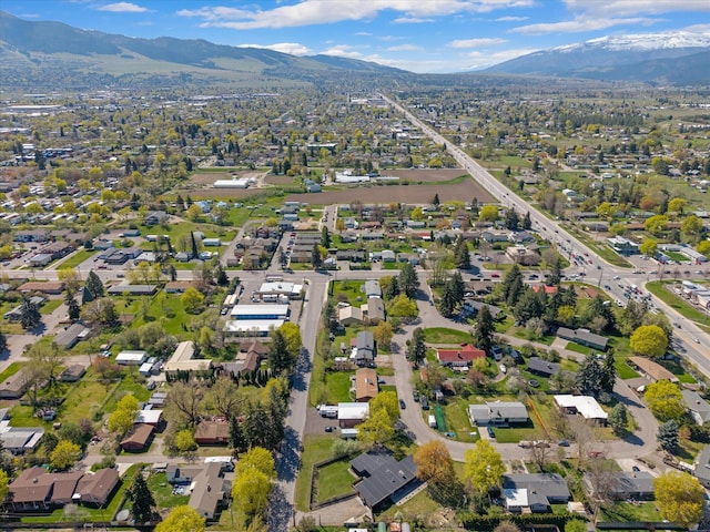 drone / aerial view featuring a mountain view