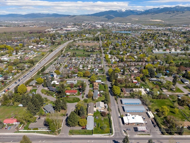 drone / aerial view featuring a mountain view