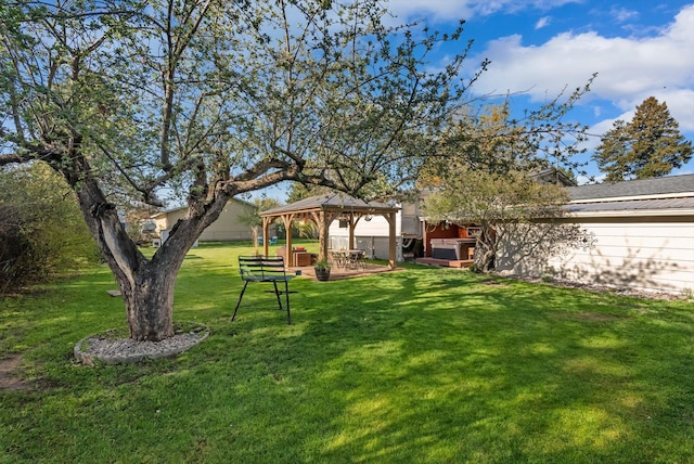 view of yard with a gazebo and fence