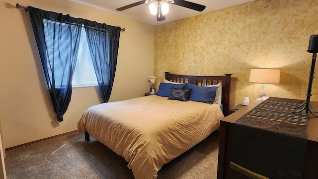 bedroom featuring baseboards, a ceiling fan, and carpet