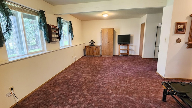 carpeted spare room with visible vents