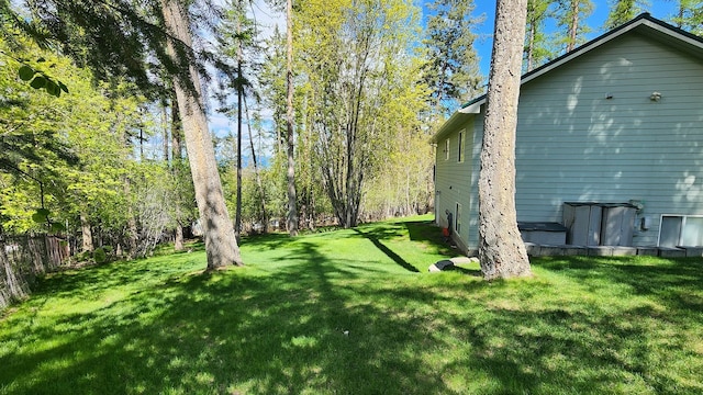 view of yard with fence