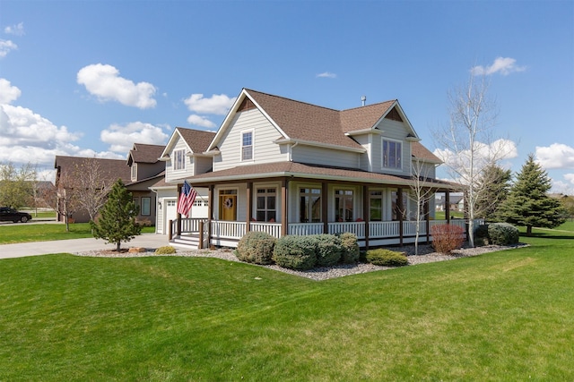 view of front of home with a porch, concrete driveway, a shingled roof, and a front yard