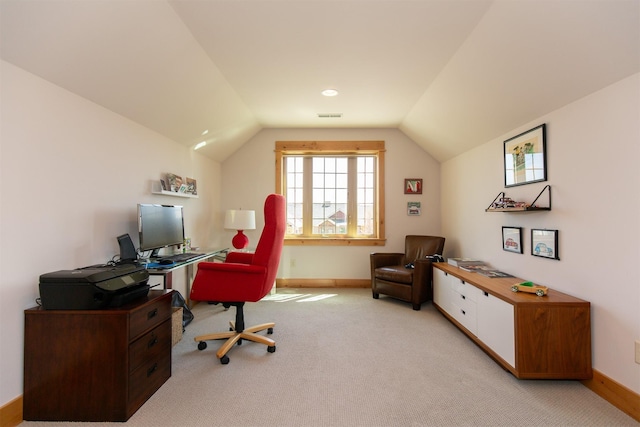 office with baseboards, light carpet, lofted ceiling, and visible vents