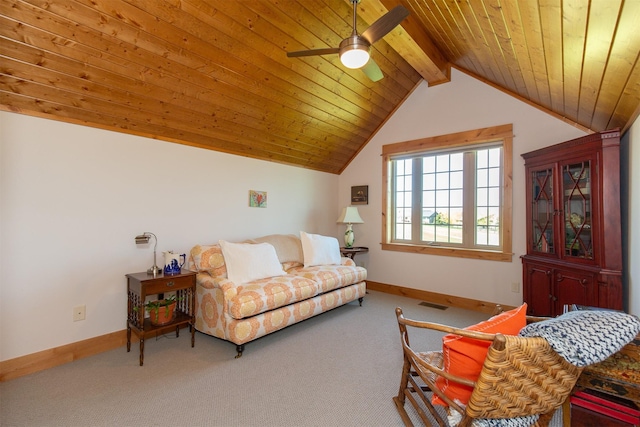 interior space featuring wooden ceiling, carpet floors, baseboards, and vaulted ceiling with beams