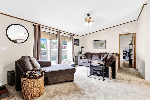 living room with a ceiling fan, carpet floors, visible vents, vaulted ceiling, and ornamental molding
