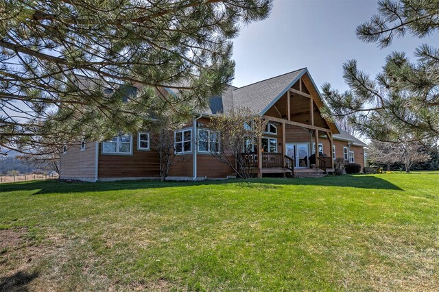 406 Back Nine Ln, Hamilton, MT 59840 - back of house with a deck and a lawn