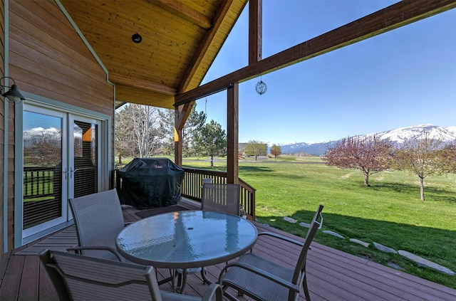 406 Back Nine Ln, Hamilton, MT 59840 - deck with a grill, a yard, outdoor dining space, and a mountain view