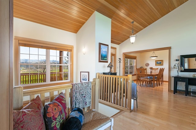 406 Back Nine Ln, Hamilton, MT 59840 - hall featuring vaulted ceiling, a wealth of natural light, wooden ceiling, and wood finished floors