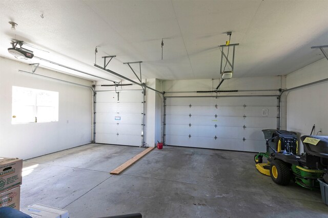 406 Back Nine Ln, Hamilton, MT 59840 - garage with a garage door opener