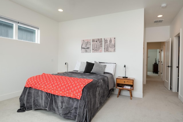 carpeted bedroom with baseboards, visible vents, and recessed lighting