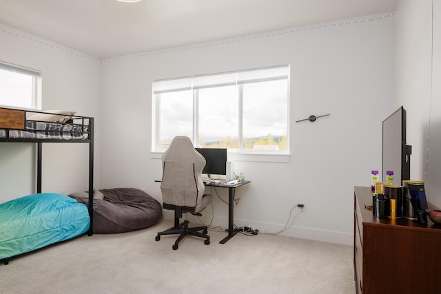 carpeted bedroom with baseboards