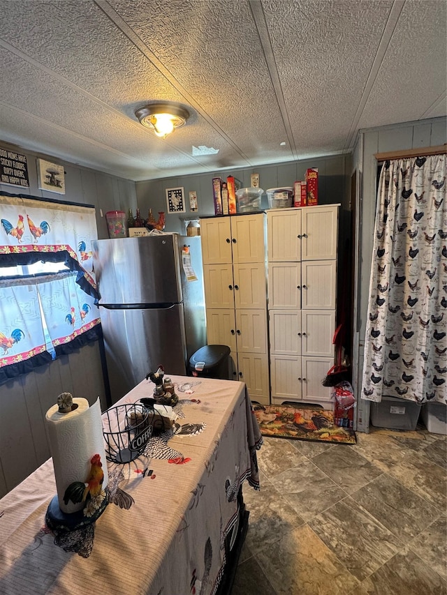 interior space with freestanding refrigerator