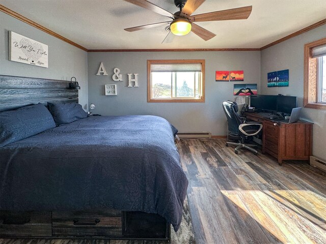101 11th Ave N, Shelby, MT 59474 - bedroom featuring crown molding, a ceiling fan, baseboard heating, and wood finished floors