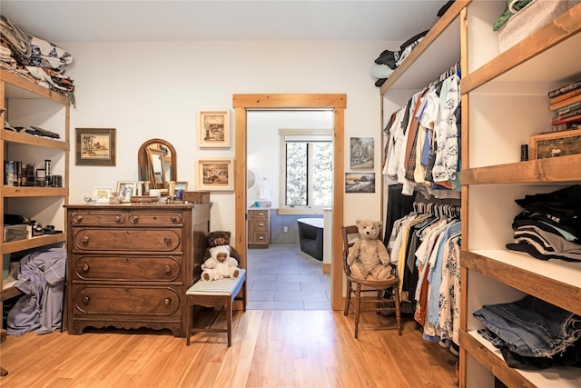 34426 Ridge Rd, Polson, MT 59860 - walk in closet with light wood-style flooring