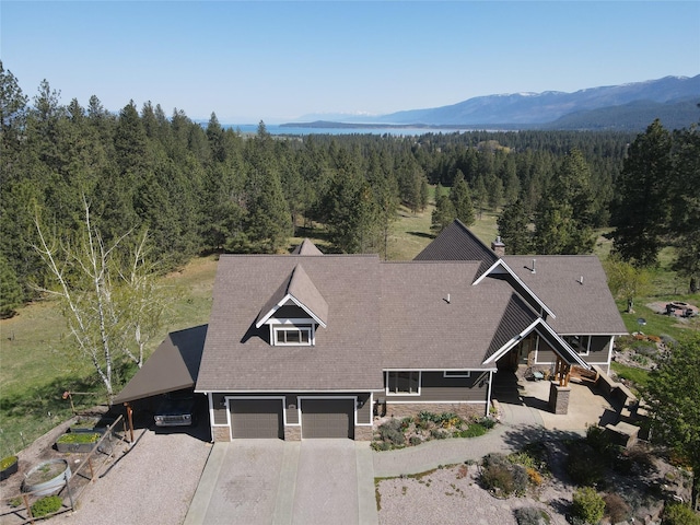 34426 Ridge Rd, Polson, MT 59860 - view from above of property with a heavily wooded area and mountains