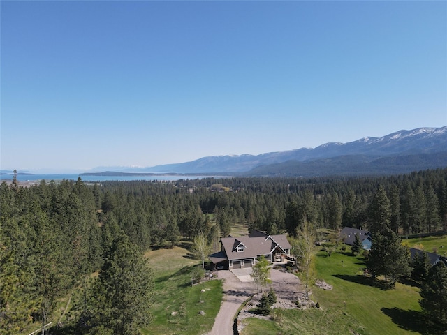 34426 Ridge Rd, Polson, MT 59860 - view of subject property with a forest and a mountain backdrop