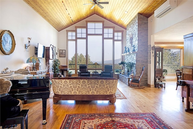 34426 Ridge Rd, Polson, MT 59860 - living area featuring an AC wall unit, high vaulted ceiling, ceiling fan, wooden ceiling, and wood finished floors
