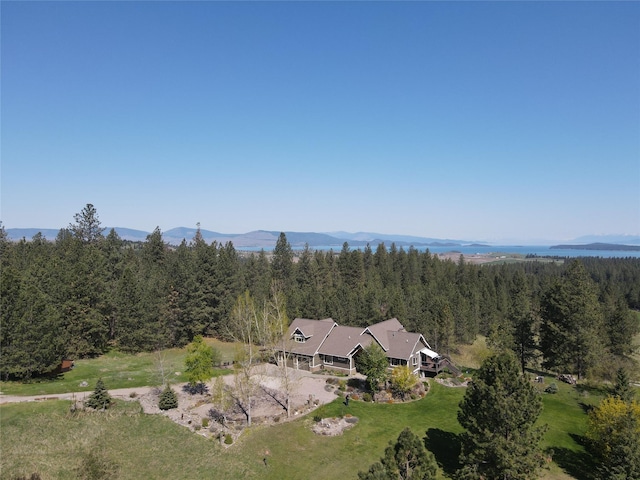 34426 Ridge Rd, Polson, MT 59860 - view from above of property with a forest and a mountain backdrop
