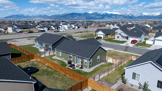 bird's eye view with a mountain view and a residential view