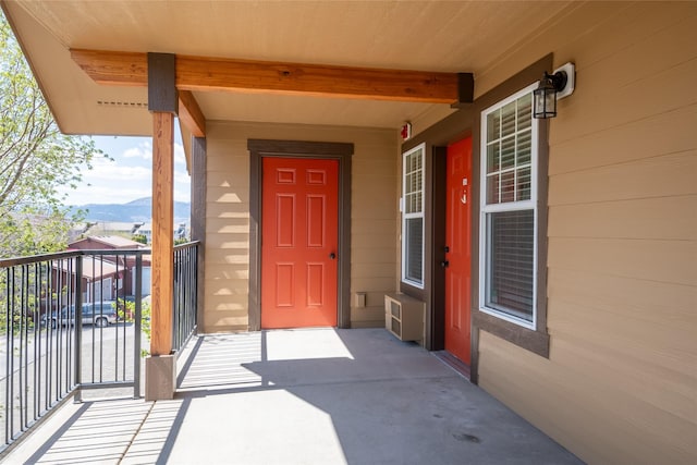 3010 Tina Ave Unit 306, Missoula, MT 59808 - view of exterior entry featuring a mountain view and a balcony