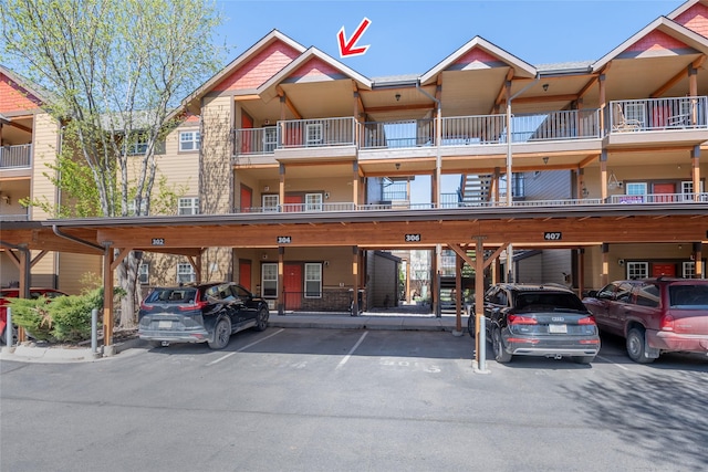 3010 Tina Ave Unit 306, Missoula, MT 59808 - view of apartment building / complex with covered parking