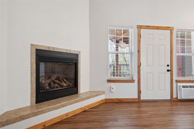 3010 Tina Ave Unit 306, Missoula, MT 59808 - foyer entrance featuring wood finished floors and a tile fireplace