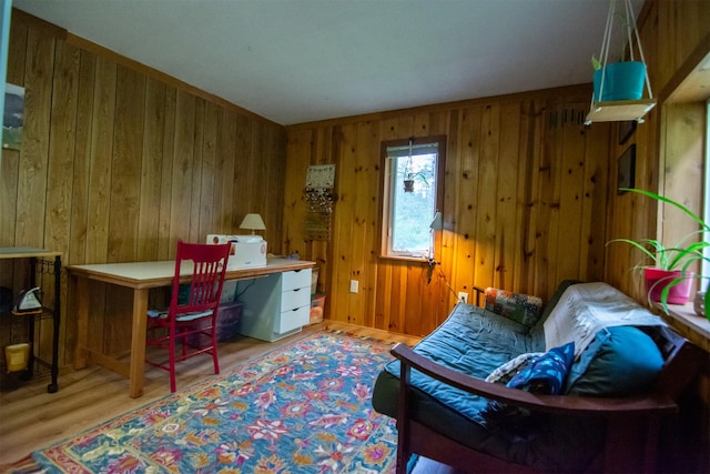 office space featuring wooden walls and wood finished floors