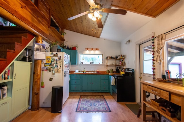 kitchen with freestanding refrigerator, light wood finished floors, a ceiling fan, and electric stove