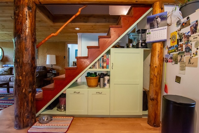 interior space with light wood-type flooring and stairway