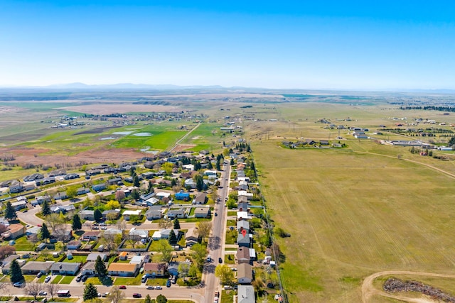 aerial view featuring a rural view and a mountain view