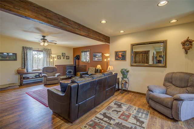 45 Bay Rd, Whitehall, MT 59759 - living area featuring a wood stove, wood finished floors, beamed ceiling, and recessed lighting