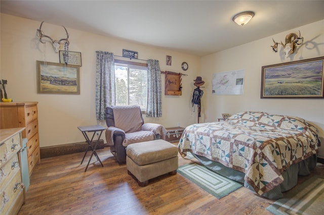 45 Bay Rd, Whitehall, MT 59759 - bedroom with baseboards and wood finished floors