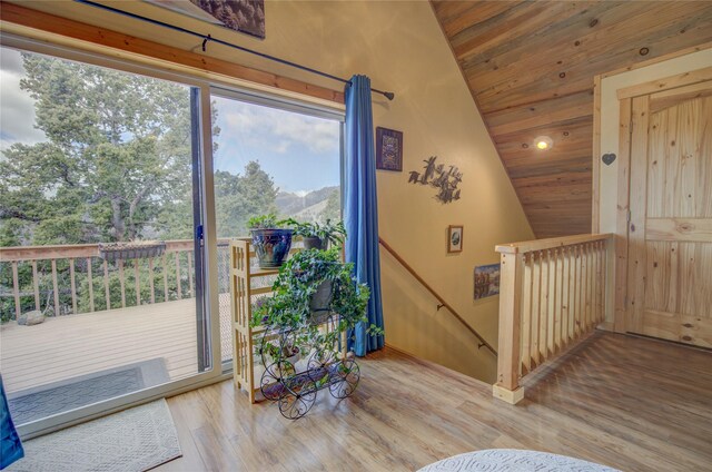 45 Bay Rd, Whitehall, MT 59759 - doorway to outside featuring wood ceiling, baseboards, wood finished floors, and lofted ceiling