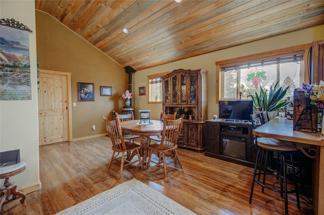 45 Bay Rd, Whitehall, MT 59759 - dining space with vaulted ceiling, wood ceiling, baseboards, and wood finished floors