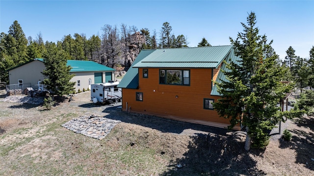 45 Bay Rd, Whitehall, MT 59759 - rear view of property featuring fence and metal roof