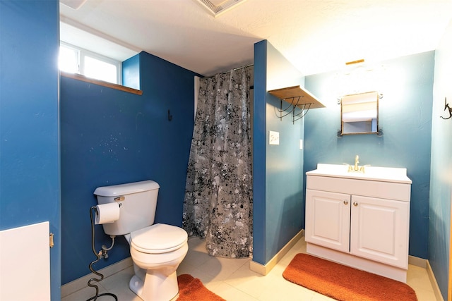 bathroom with toilet, visible vents, curtained shower, and vanity