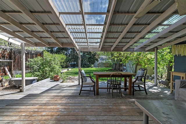 deck featuring fence and outdoor dining space