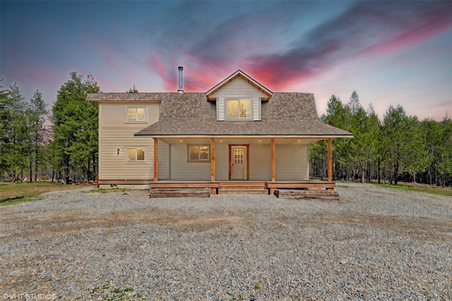 515 Gopher Ln, Marion, MT 59925 - view of front facade with a shingled roof and covered porch