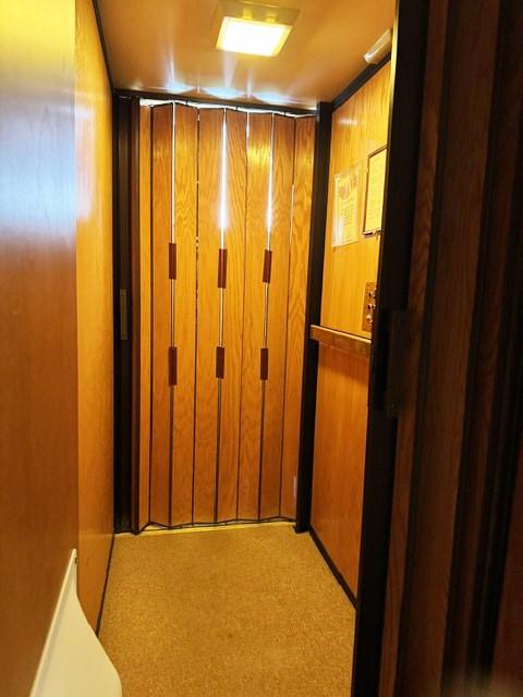 105 Garden Dr Unit D, Kalispell, MT 59901 - interior space with elevator and carpet flooring