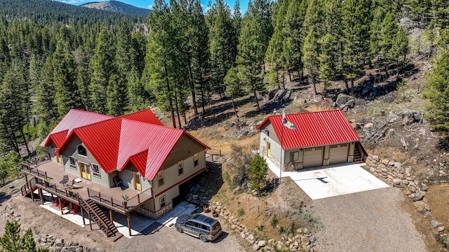 617 Mcclellan Creek Rd, Clancy, MT 59634 - aerial view of property and surrounding area featuring a heavily wooded area and mountains