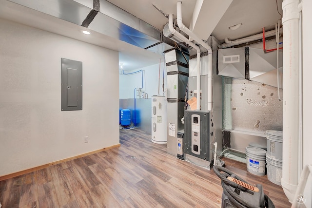 617 Mcclellan Creek Rd, Clancy, MT 59634 - utility room with electric panel and electric water heater