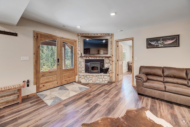 617 Mcclellan Creek Rd, Clancy, MT 59634 - living area with french doors, wood finished floors, and recessed lighting