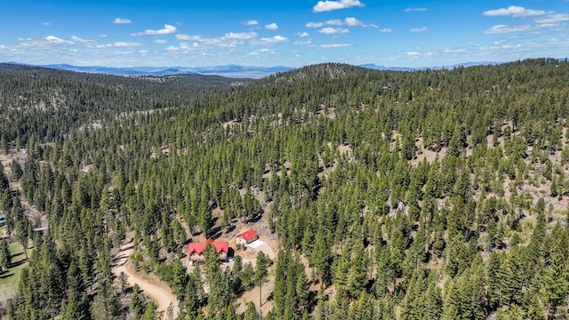 617 Mcclellan Creek Rd, Clancy, MT 59634 - drone / aerial view of a heavily wooded area and mountains