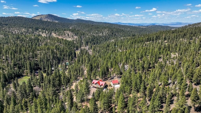 617 Mcclellan Creek Rd, Clancy, MT 59634 - aerial overview of property's location with a heavily wooded area and mountains