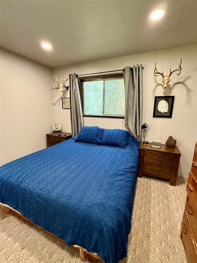 bedroom with carpet flooring and recessed lighting