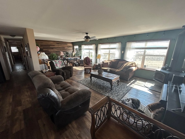55 Mills Rd, Whitehall, MT 59759 - living room with a ceiling fan and wood finished floors